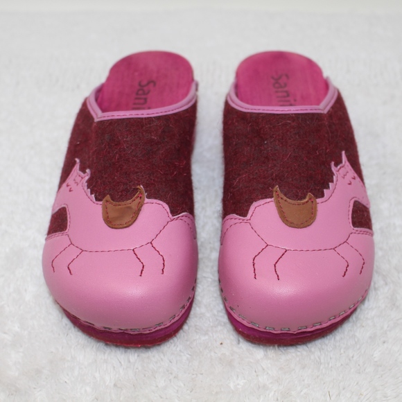 pink wooden clogs